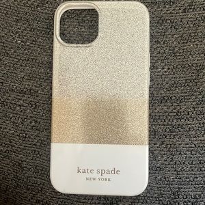 Kate spade phone case colors gold and white fits USED but in good condition.
